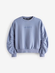 smALLSAINTS Mid Blue Girls Oversized Cygni Ruched Sleeve Sweatshirt. - Image 4 of 7