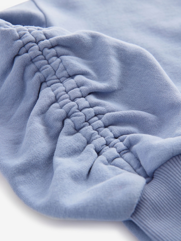 smALLSAINTS Mid Blue Girls Oversized Cygni Ruched Sleeve Sweatshirt. - Image 7 of 7