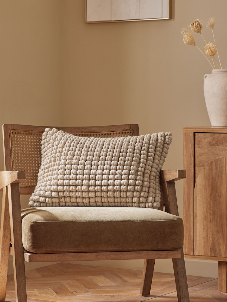 Greige 40 x 59cm Global Bobble 100% Cotton Cushion - Image 1 of 4