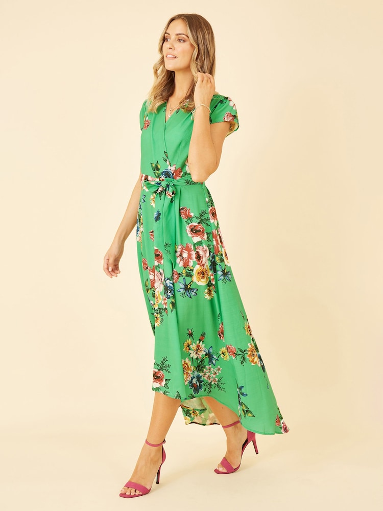 Grün - Mela Blumiges Midikleid mit Wickeloptik und abgerundetem Saum - Bild 1 von 5 Grün - Mela Blumiges Midikleid mit Wickeloptik und abgerundetem Saum - Bild 1 von 5
