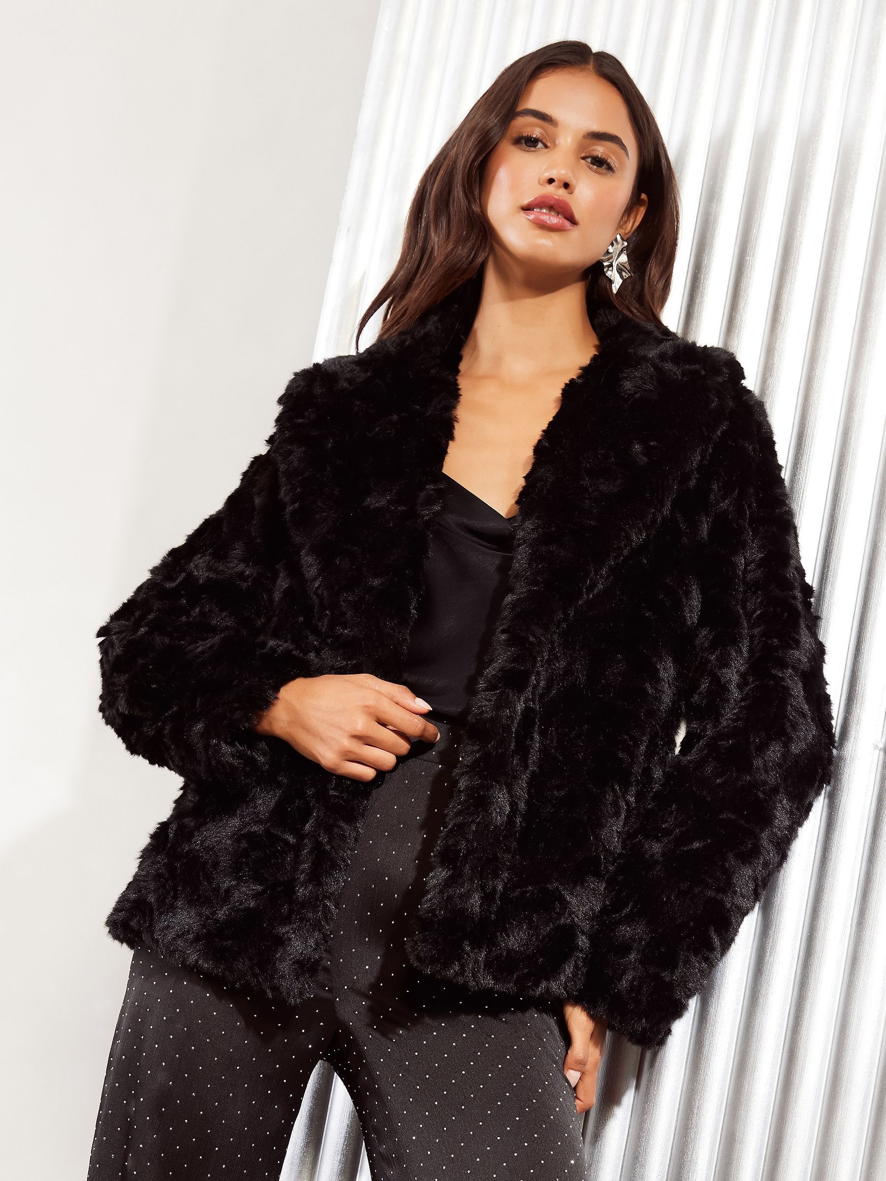 Black textured faux fur coat on sale