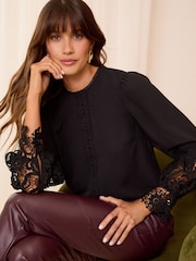 Love & Roses Black Lace Cuff Crew Neck Blouse - Image 1 of 4
