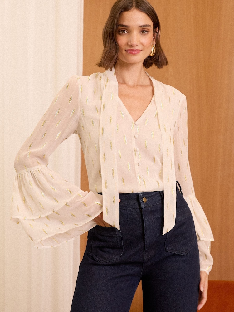 Love & Roses Metallic Pussy Bow Flute Sleeve Blouse - Image 1 of 4 Love & Roses Metallic Pussy Bow Flute Sleeve Blouse - Image 1 of 4