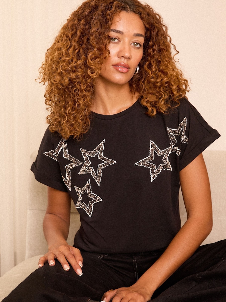 Love & Roses Black Star Embellished Roll Sleeve T-Shirt - Image 1 of 4 Love & Roses Black Star Embellished Roll Sleeve T-Shirt - Image 1 of 4