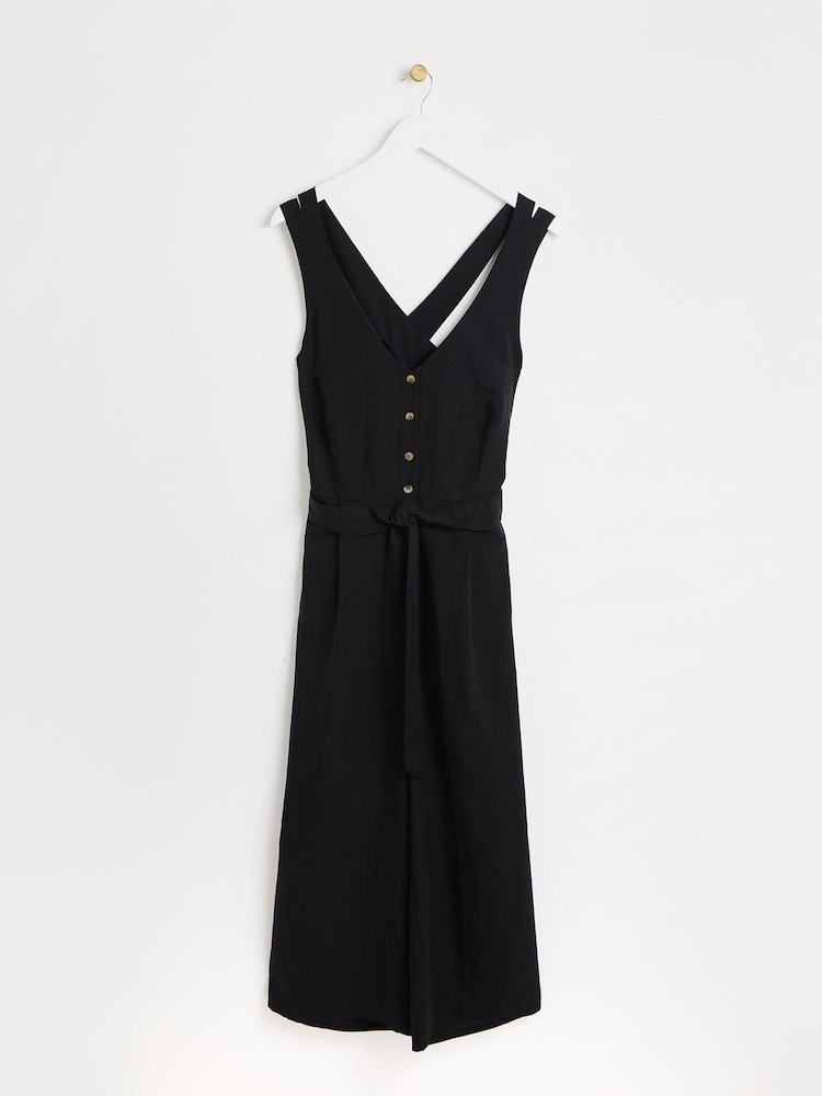 Oliver Bonas Black Belted Sleeveless Jumpsuit With Linen - Image 1 of 6 Oliver Bonas Black Belted Sleeveless Jumpsuit With Linen - Image 1 of 6