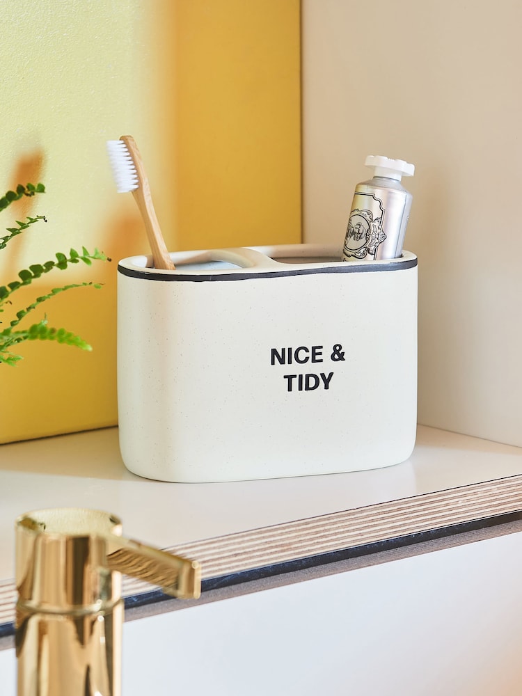 Slogan „Nice & Tidy“ Zahnbürste - Bild 1 von 3 Slogan „Nice & Tidy“ Zahnbürste - Bild 1 von 3
