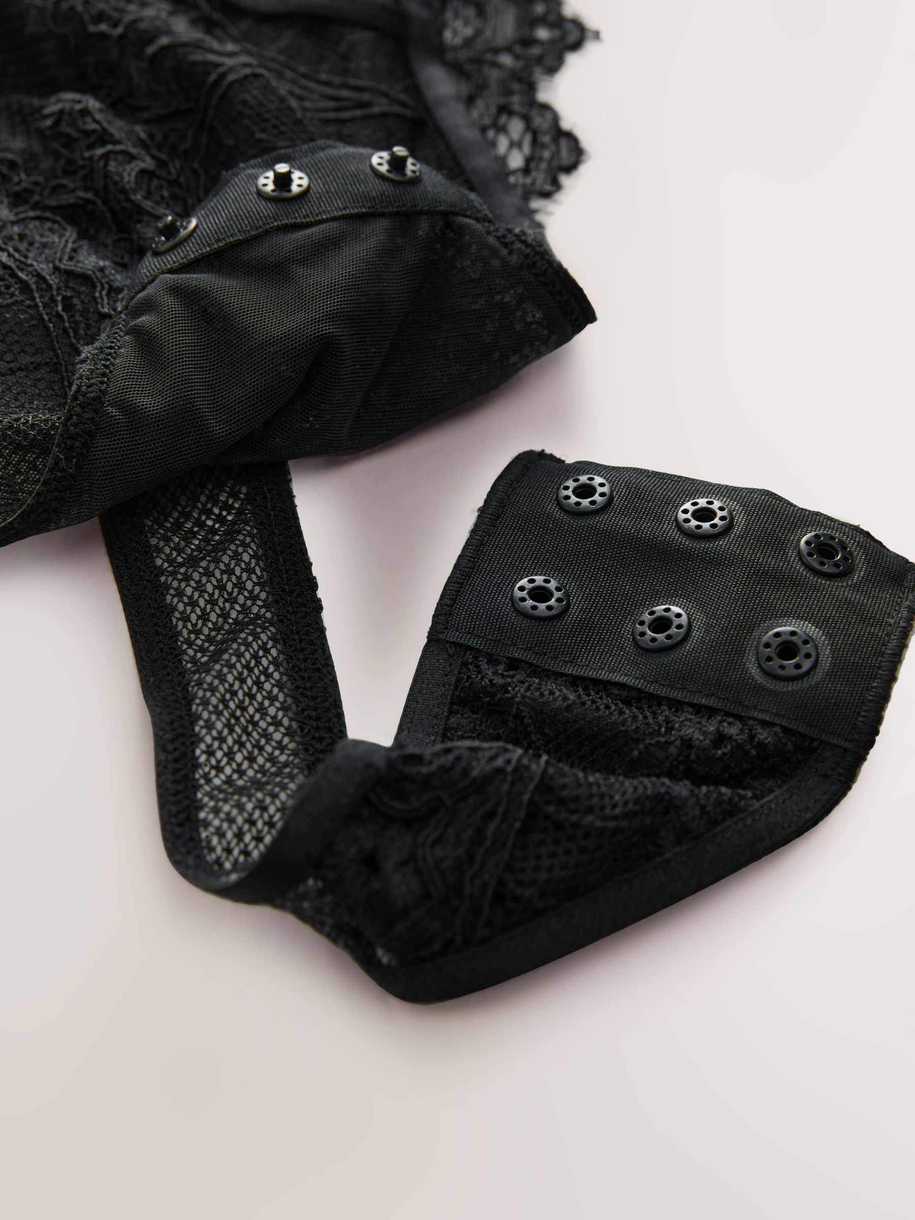 Buy Lipsy Black Lace Low Plunge Thong Bodysuit from Next Saudi Arabia