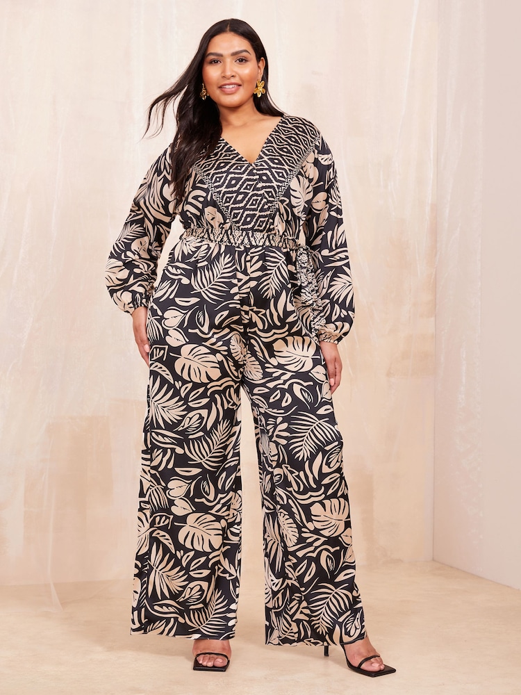 Curves Like These Black/White Long Sleeve Wrap Jumpsuit - Image 1 of 4