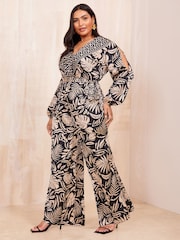 Curves Like These Black/White Long Sleeve Wrap Jumpsuit - Image 2 of 4