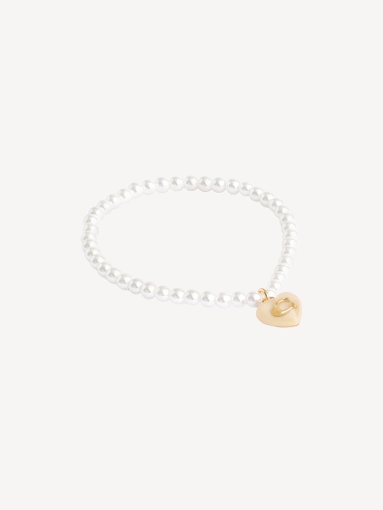 COACH Gold Signature Heart Charm Pearl Bracelet - Image 1 of 3 COACH Gold Signature Heart Charm Pearl Bracelet - Image 1 of 3
