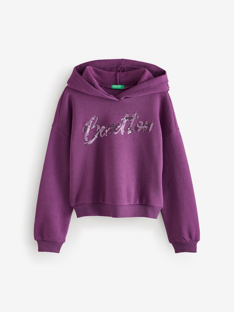 Benetton Purple Cropped Pull On Hoodie Ribbed Cuffs And Hem With Sequin Embroidery On Front - Image 1 of 1 Benetton Purple Cropped Pull On Hoodie Ribbed Cuffs And Hem With Sequin Embroidery On Front - Image 1 of 1