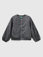 Chaqueta bomber negra con tejido de lentejuelas pequeñas y cremallera con logo de Benetton - Imagen 1 de 3