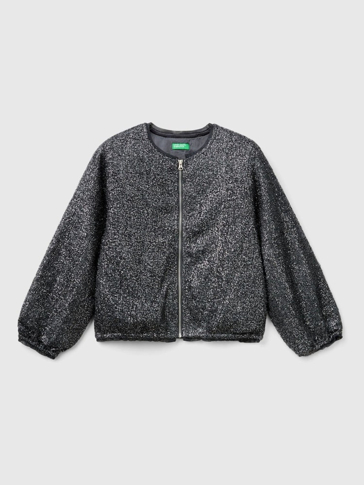 Chaqueta bomber negra con tejido de lentejuelas pequeñas y cremallera con logo de Benetton - Imagen 1 de 3