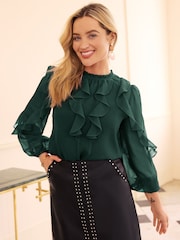 Love & Roses Green Ruffle Crew Neck Long Sleeve Blouse - Image 1 of 4