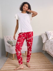 طقم بيجامة جيرسيه بخامة %100 قطن مزيّن بفيونكة من Laura Ashley - صورة 2 من 5