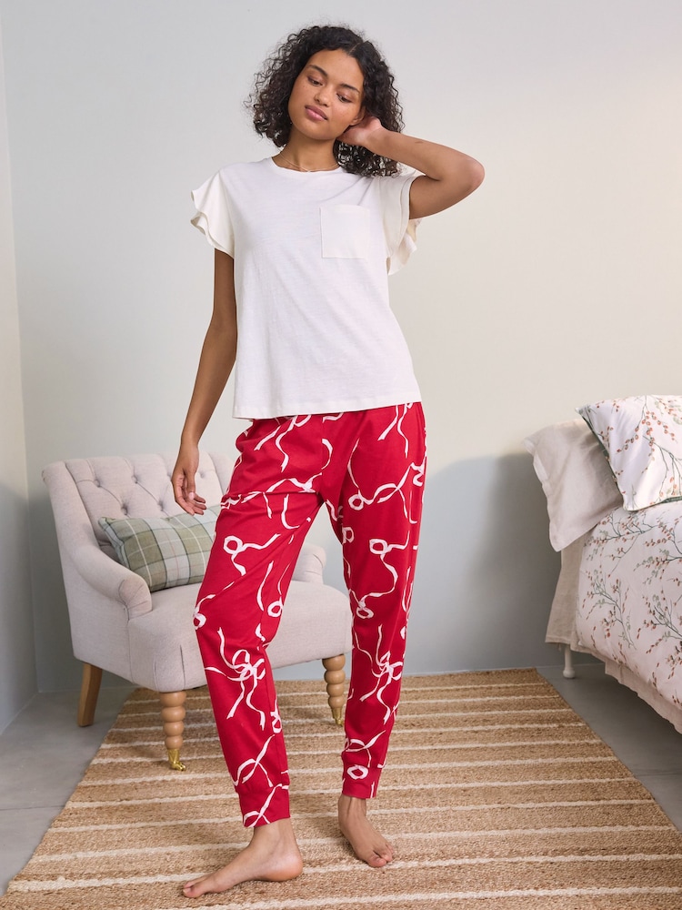 طقم بيجامة جيرسيه بخامة %100 قطن مزيّن بفيونكة من Laura Ashley - صورة 2 من 5