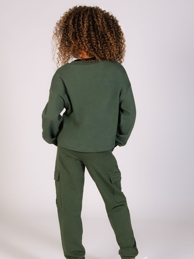 Sudadera corta con logotipo para niña - Imagen 2 de 6 Sudadera corta con logotipo para niña - Imagen 2 de 6