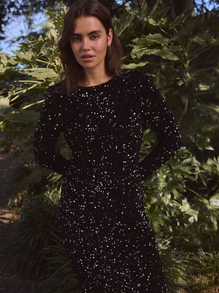 Buy Black Long Sleeve Sequin Bow Back Midi Dress from Next Oman