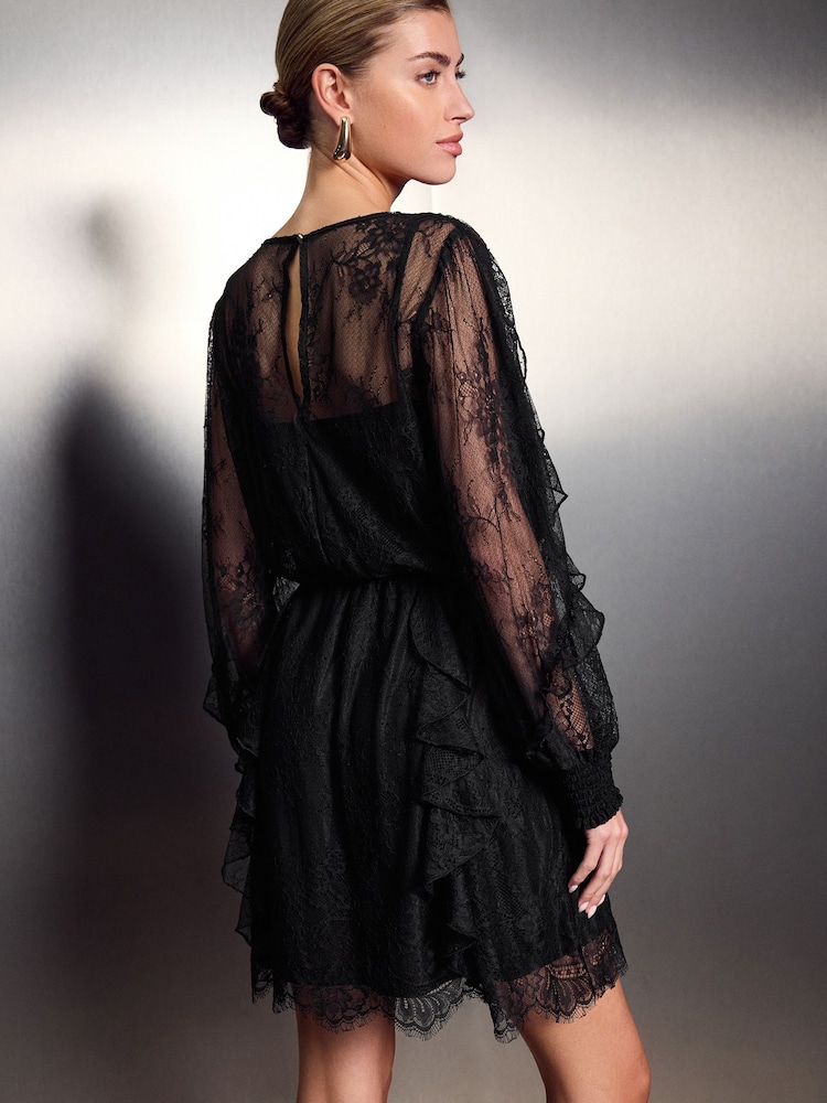 Schwarz - Langarm-Minikleid mit Spitzen- und Rüschendetails - Bild 2 von 7 Schwarz - Langarm-Minikleid mit Spitzen- und Rüschendetails - Bild 2 von 7