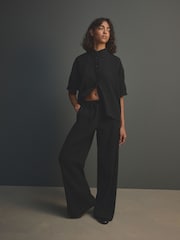 Noir - Pantalon large texturé à jambe large coordonné avec lin - Image 1 of 8