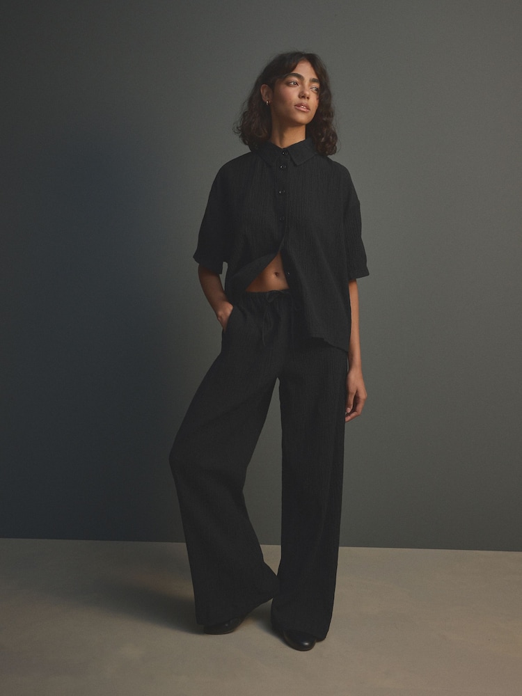Noir - Pantalon large texturé à jambe large coordonné avec lin - Image 1 of 8