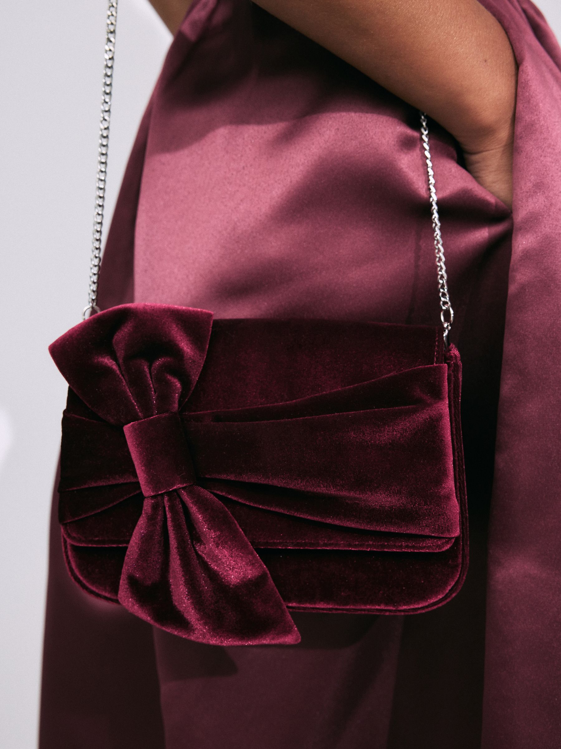 Bow clutch bag store