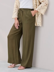 Cotton Traders Green Crinkle Pull On Wide Leg Trousers - Image 1 of 4