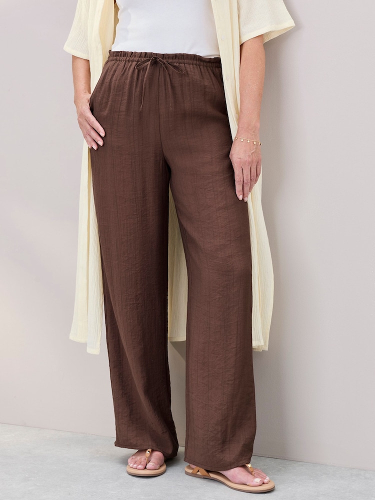 Cotton Traders Brown Crinkle Pull On Wide Leg Trousers - Image 1 of 4