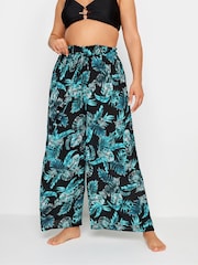 Yours Curve Black Tropical Print Crinkle Tassel Trousers - Image 1 of 3