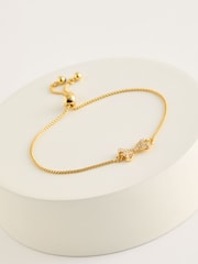 Ted Baker Gold Tone BARSET: Crystal Bow Adjustable Bracelet - Image 1 of 3