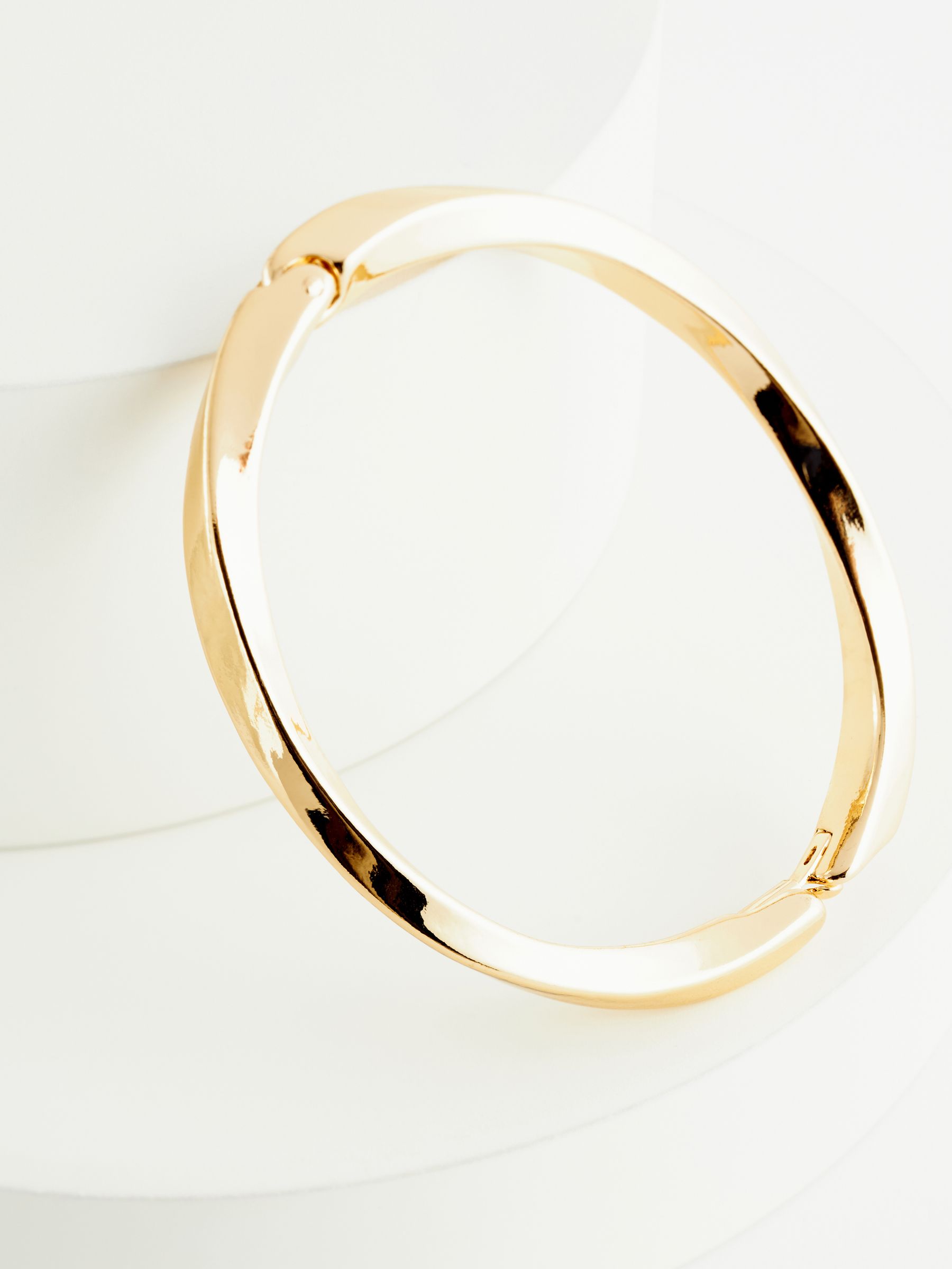 Buy Gold Tone Twist Bangle from Next Canada