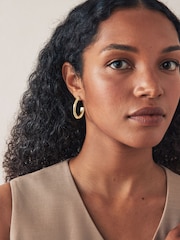 Gold Tone Twist Hoop Earrings - Image 1 of 4