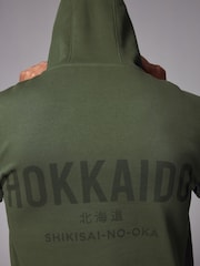 Verde caqui - Sudadera de alto contenido en algodón con diseño gráfico estampado y capucha - Imagen 7 de 10