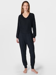 Sweaty Betty Black Gaia Performance Yoga Long Sleeve Jumpsuit - Image 1 of 7