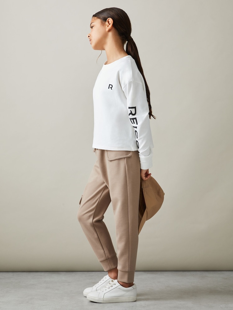 Reiss Camel Amina 4-9 yrs Drawstring Pocket Detail Tapered Joggers - Image 1 of 4