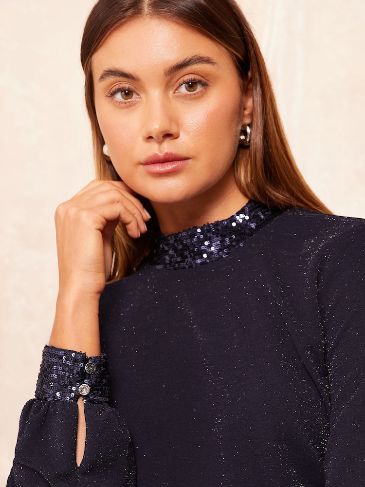 Friends Like These Navy Blue Jersey HIgh Neck Blouse with Sequin Detail - Image 1 of 4