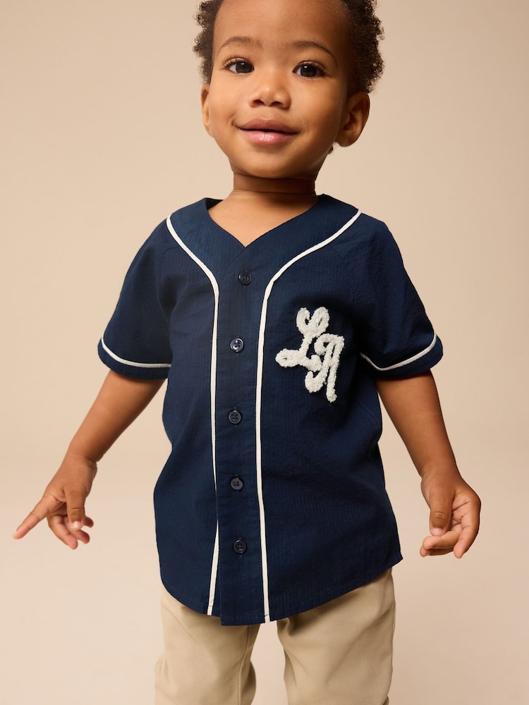 Navy Varsity 100% Cotton Short Sleeve Varsity Baseball Neck Shirt (3mths-7yrs) - Image 1 of 7