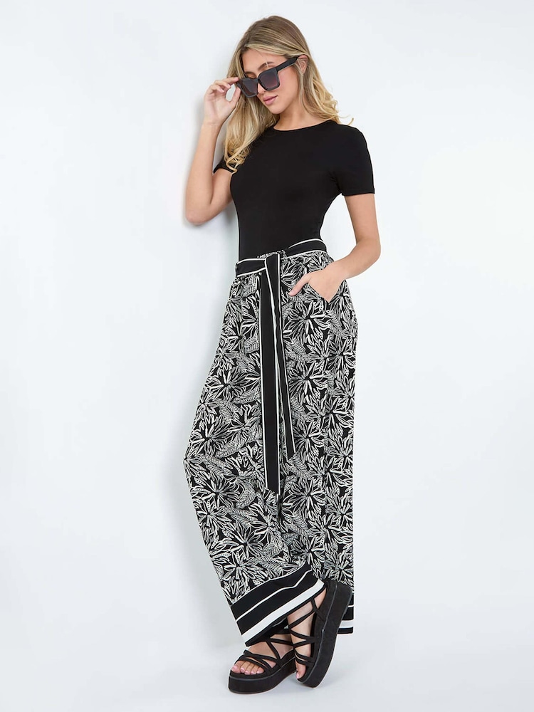 Dusk Black Floral Border Print Wide Leg Trousers - Image 1 of 5
