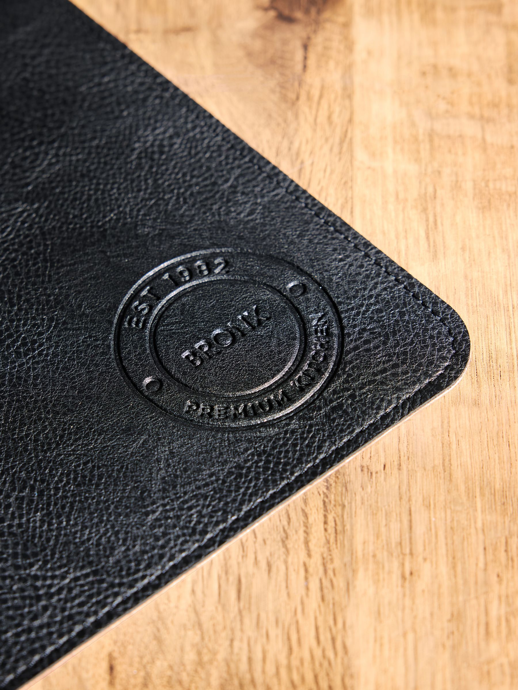Buy Set of 4 Black Reversible Soft Faux Leather Placemats from