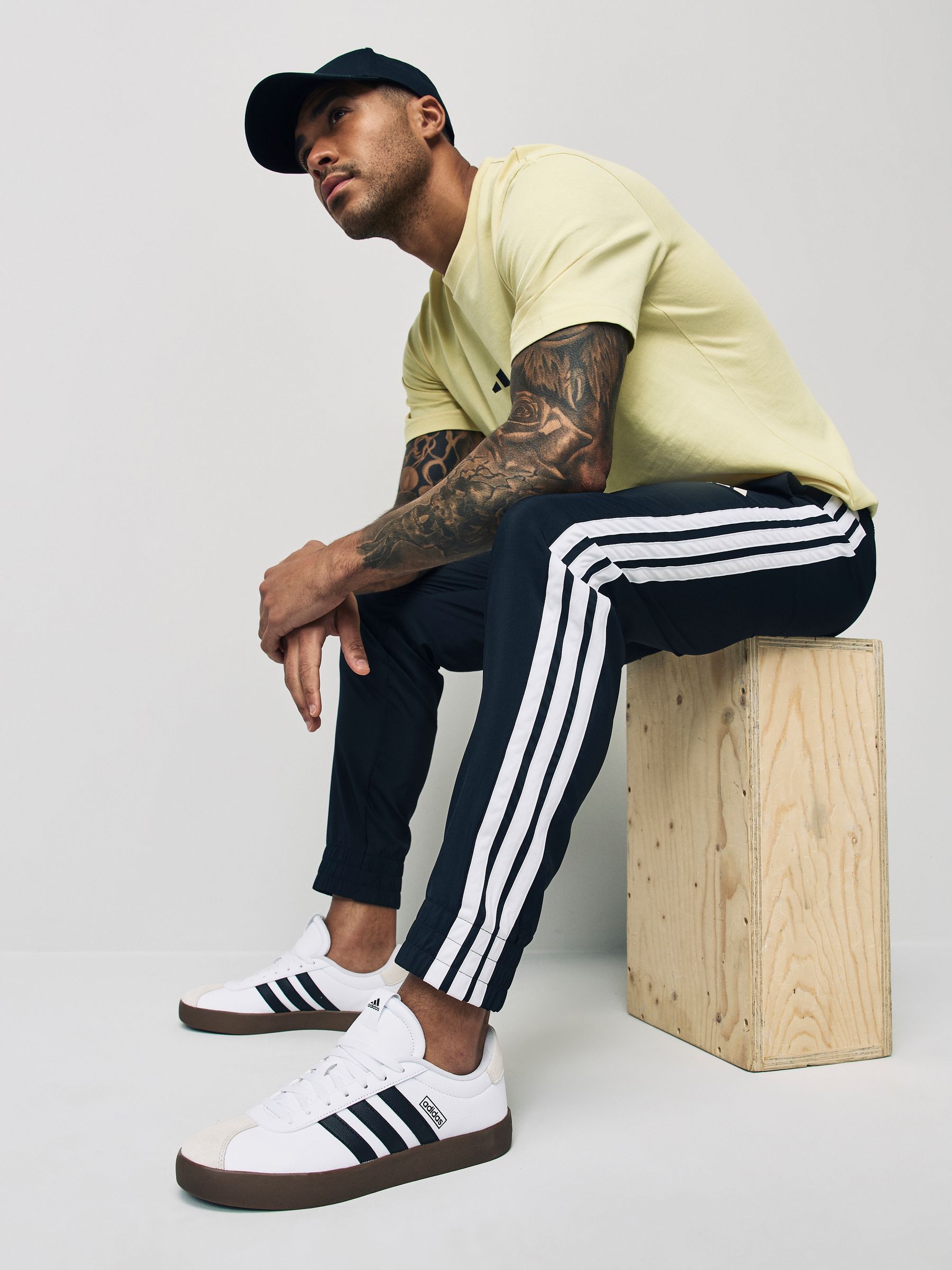 Buy adidas Black Essentials 3-Stripes Woven Joggers from the Next