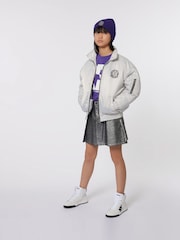 فضي - تنورة صغيرة بطيات لامعة من DKNY - Image 1 of 4