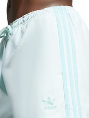 Verde - Shorts de baño de 3 rayas y 5 pulgadas Adicolor de adidas - Imagen 5 de 7