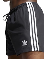 Negro - Shorts de baño de 3 rayas y 5 pulgadas Adicolor de adidas - Imagen 4 de 5