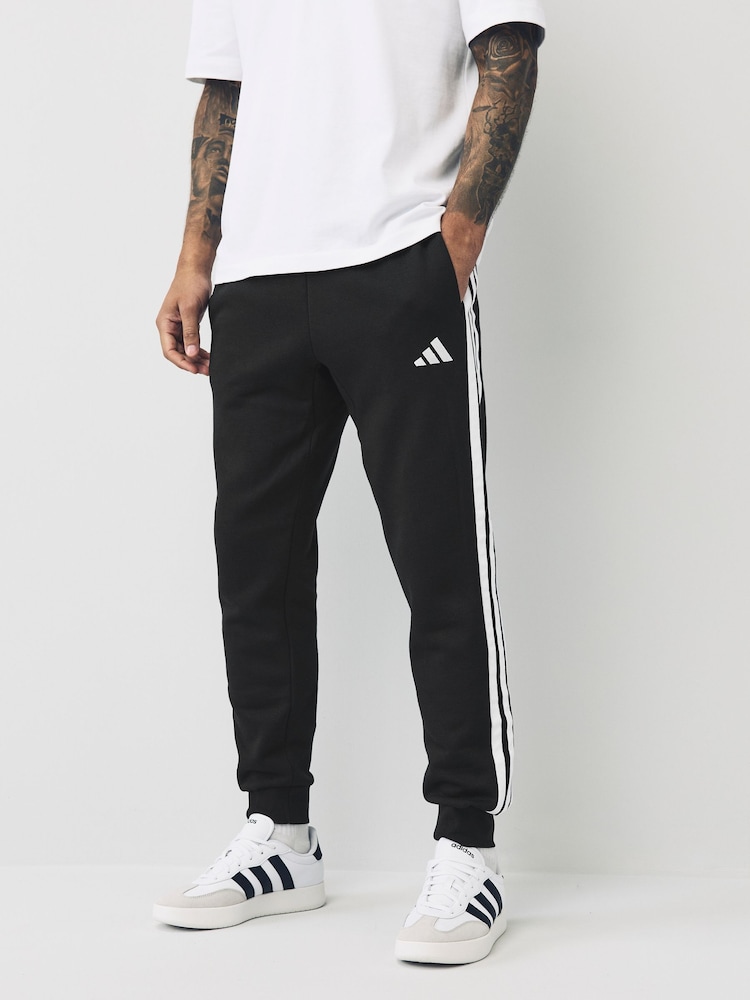 adidas Black Essentials 3-Stripes Fleece Joggers - Image 1 of 13