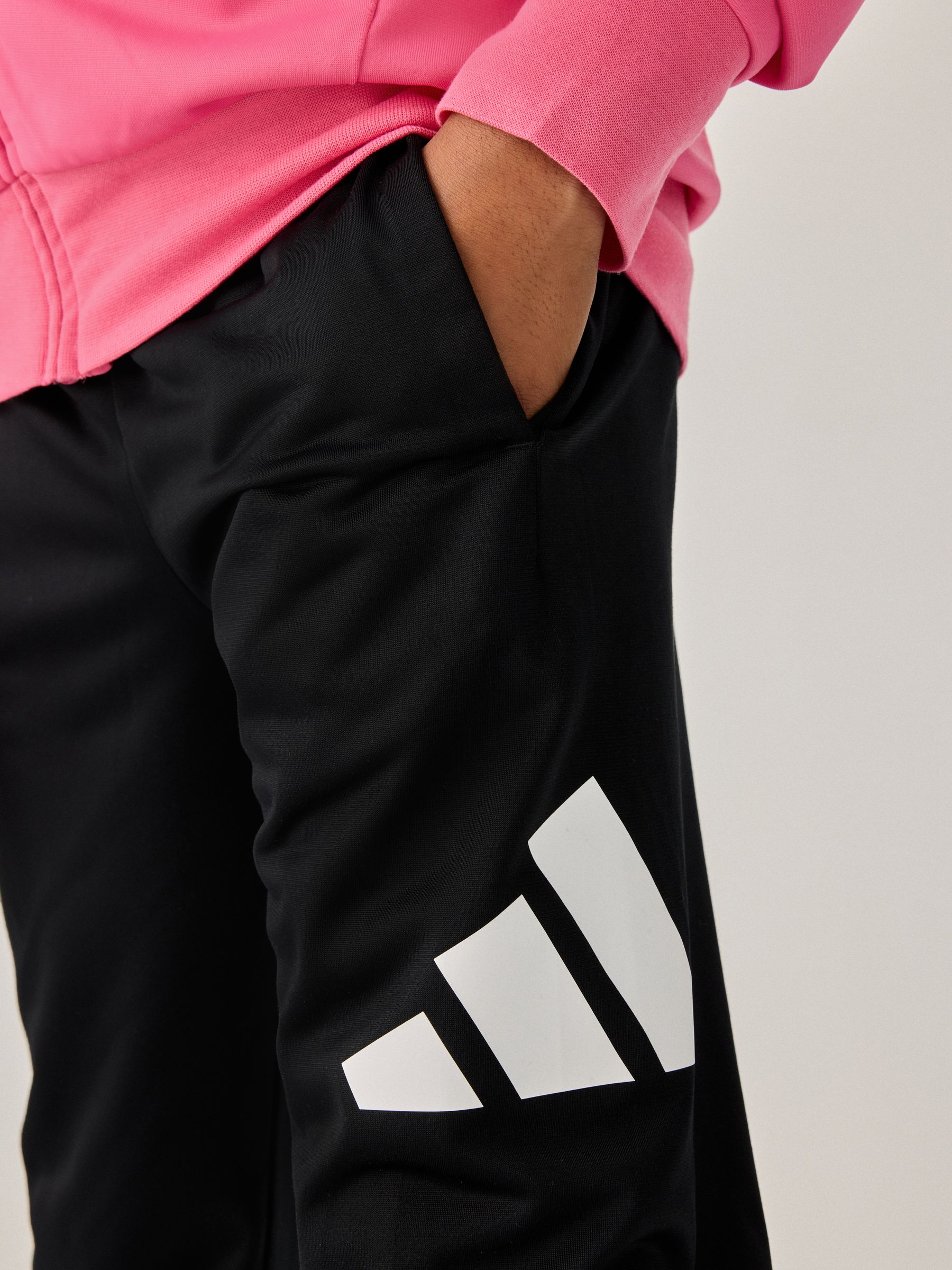 Buy adidas Pink Large Essentials Logo Tracksuit from Next USA