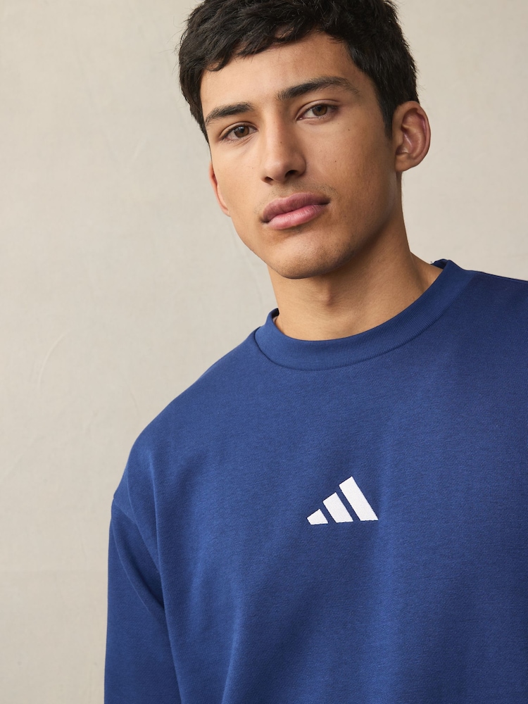 Синій - adidas Essentials Feelcozy Fleece світшот - Image 9 of 14