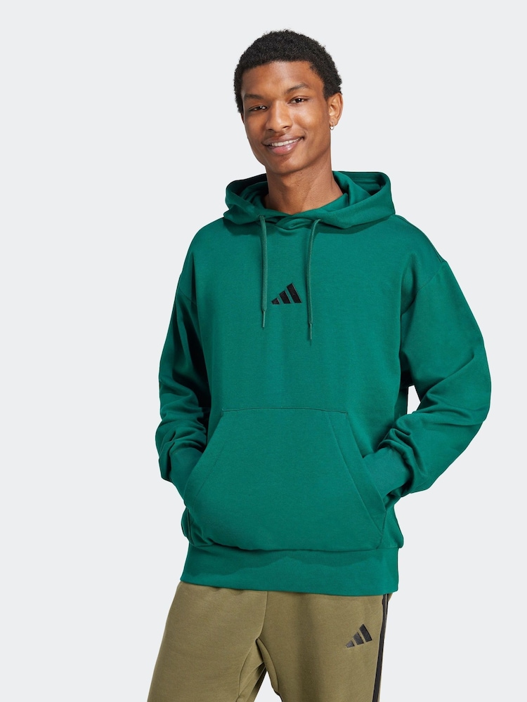 adidas Green Essentials Feelcozy Fleece Hoodie - Image 1 of 6