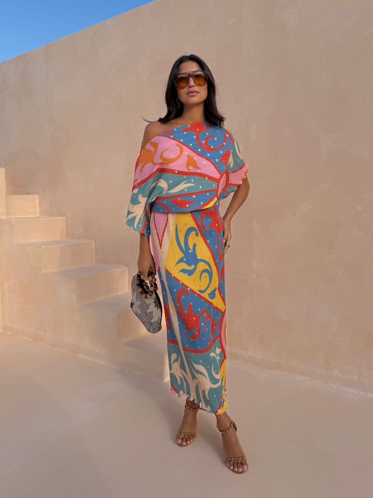 Never Fully Dressed Blue Petite Tilly Plisse Dress in Kaleidoscope Print - Image 1 of 2