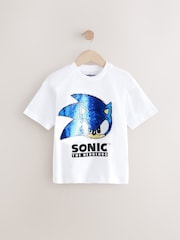 أبيض/أزرق - تيشرت مزين بالترتر بتصميم قلاب بطبعة شخصية Sonic (3-16 سنة) - صورة 1 من 5