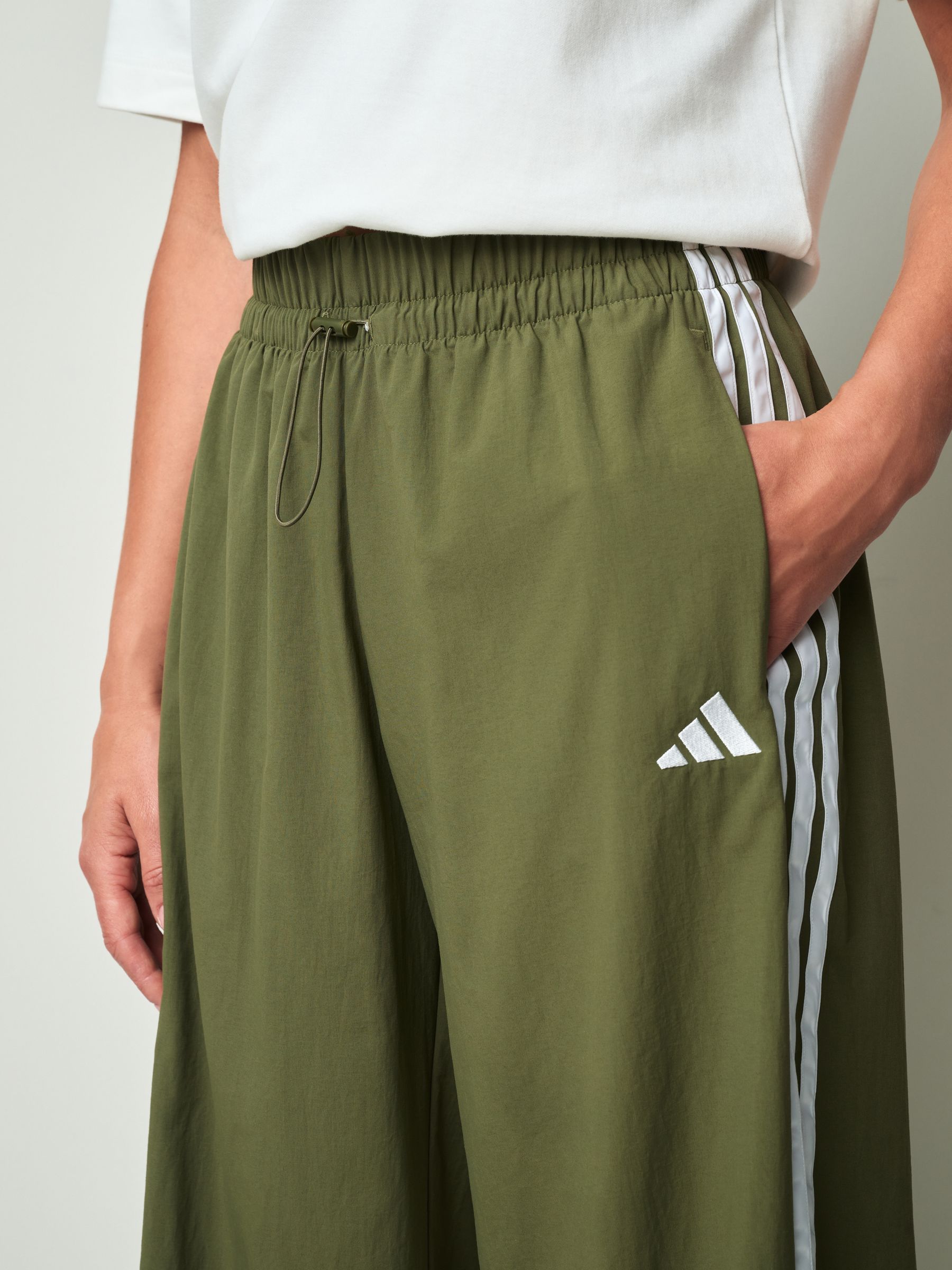 Buy adidas Green Essentials 3-Stripes Woven Wide Leg Trousers from